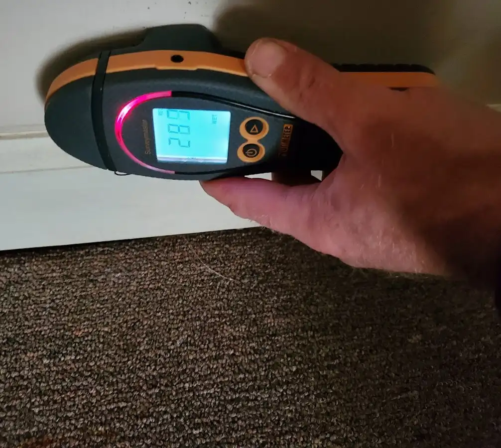 Moisture detection at baseboard during Sewage Cleanup & Sanitation in San Benito